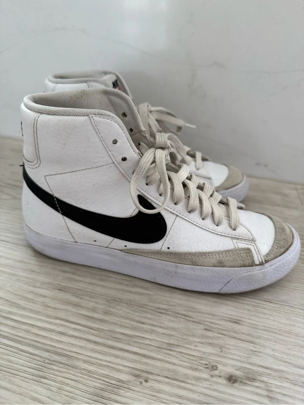 Nike Blazer Mid '77 White High-Top Sneakers with Black Swoosh